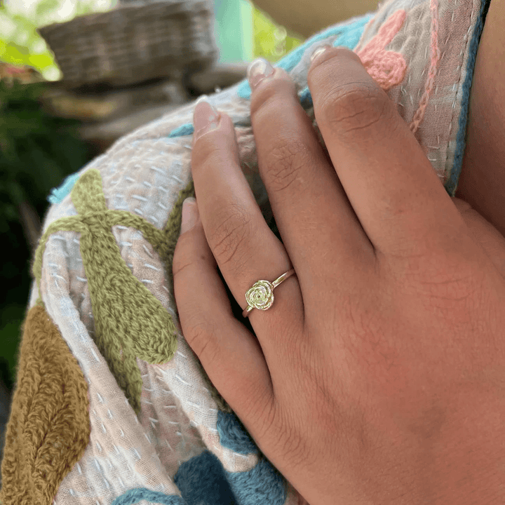 wioga-anna-auguste-gold-plated-rose-ring seen on woman's hand, beautiful gold-colored rose detail, ModelR-8823-GP-001