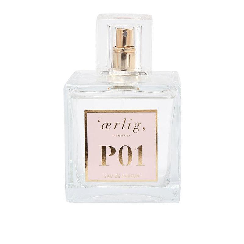 honest eau de parfum P01 100ml features an elegant, square glass bottle with a golden label. Model p01-1
