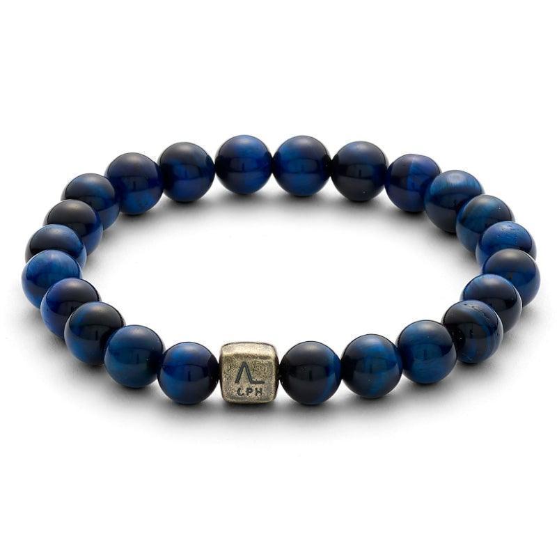 Alexander Lynggaard Bracelet Blue Tiger Eye with blue balls and golden detail. Model c00793-001-1.
