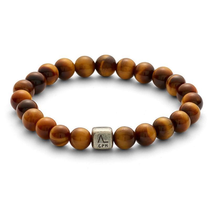 Alexander Lynggaard Bracelet Tiger Eye 8 mm, elastic bracelet with brown tiger eye beads and silver detail. Model c00223-001.