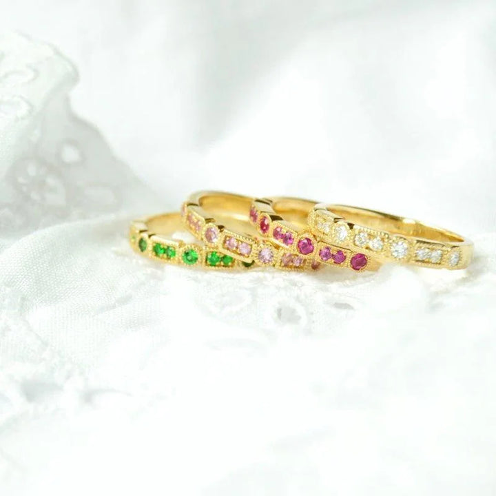 anpe atelier trine ji light pink sapphires ring shows elegant gold ring with pink sapphires, detailed on white background. Model 2416-1-001-2