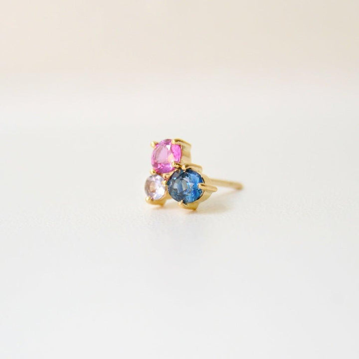 anpé atelier varnaYa 18kt gold earrings with sapphires shown close up, with pink, blue and clear stones. Model23-customized1-2