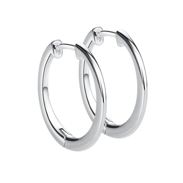 Aqua Dulce Juliet Creole Silver showcases a set of smooth, shiny silver creoles in classic style. Model 4654-4654-1