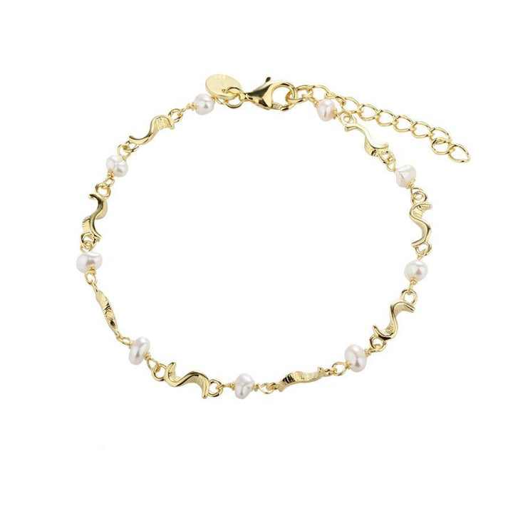Aqua Dulce Rhumba Pearl Bracelet Silver Gold-plated, elegant bracelet with white pearls on a white background. Model 5106-5106-1