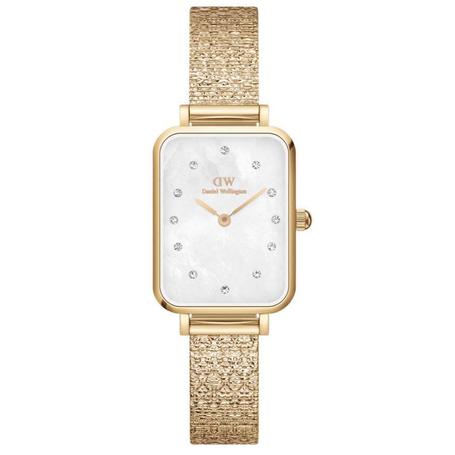 Daniel Wellington Quadro Lumine shows rectangular watch in gold-tone steel with mother-of-pearl dial and steel strap. Model DW00100582