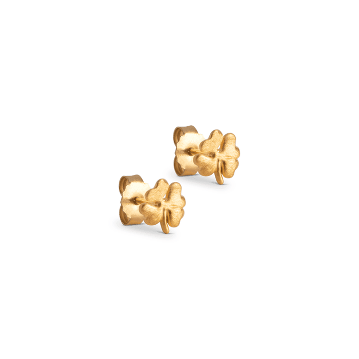 enamel organic clover ear studs shows a pair of small, matte gold colored studs with a clover shape. Model E238GM-E238GM-1