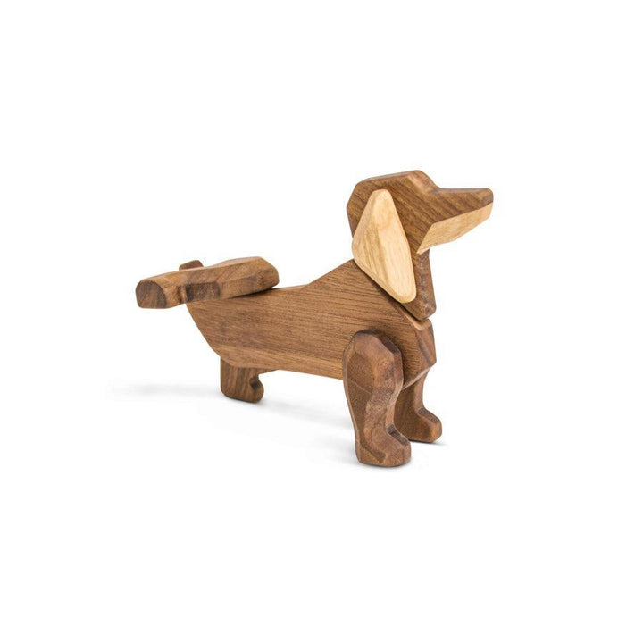 FableWood Dachshund standing on a white background, handmade in dark and light wood, Model 1034-2.