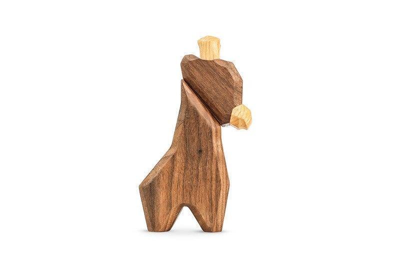 Fablewood Little Giraffe in a minimalist style, made of light and dark wood on a white background. Model 10187-1