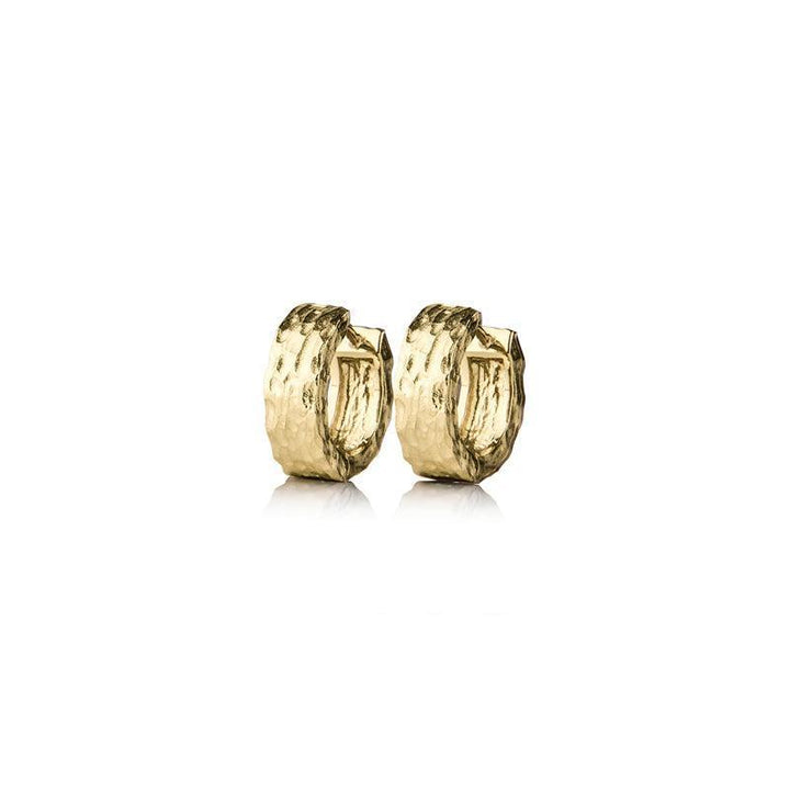 Jeberg Jewelery Piece of the Moon Huggies showcases a pair of chunky hammered gold hoop earrings. Model 5655-5655-1.