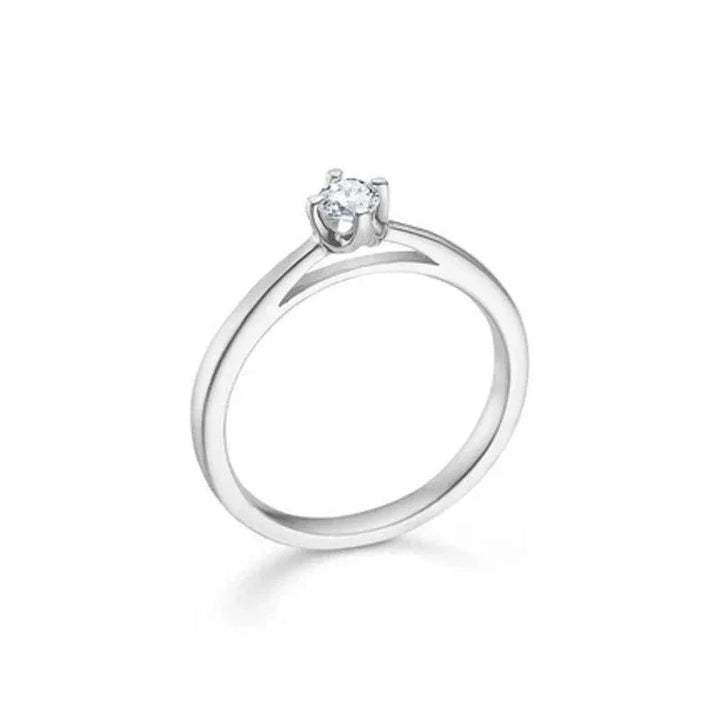 Mads Z 14 kt. Crown Ring white gold 0.16 ct shows an elegant solitaire ring in polished white gold with a clear diamond. Model 1641616-001-1.