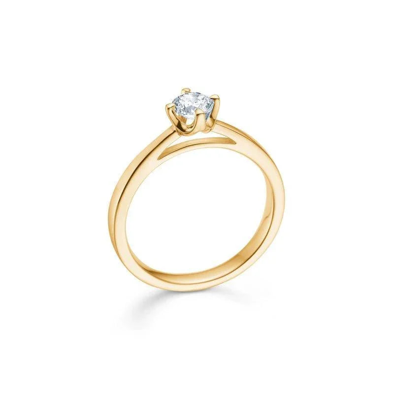 Mads Z 14 kt Crown Diamond Ring 0.34 ct shown in profile with single, round brilliant in gold ring. Model 1541634-001-1