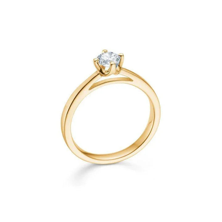 Mads Z 14 kt Crown Diamond Ring 0.34 ct shown in profile with single, round brilliant in gold ring. Model 1541634-001-1