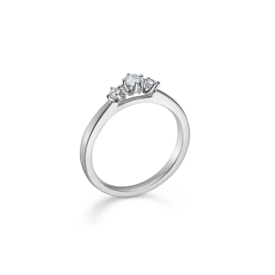 Mads Z 14kt Crown Trinity Ring 0.17 ct shows an elegant white gold ring with three sparkling diamonds. Model 1641717-001.