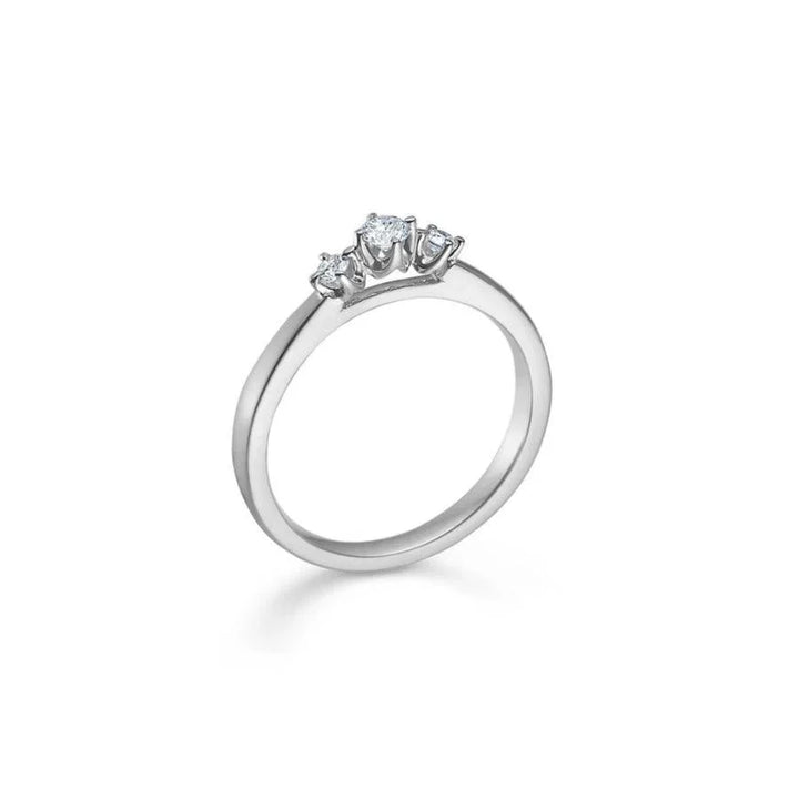 Mads Z 14kt Crown Trinity Ring 0.17 ct shows an elegant white gold ring with three sparkling diamonds. Model 1641717-001.