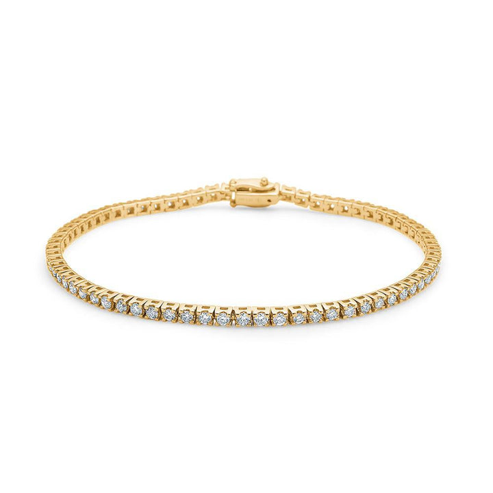 Mads Z 14kt Tennis Bracelet 1.53ct W/SI shows an elegant tennis bracelet in gold with diamonds. Model 1551515-001.