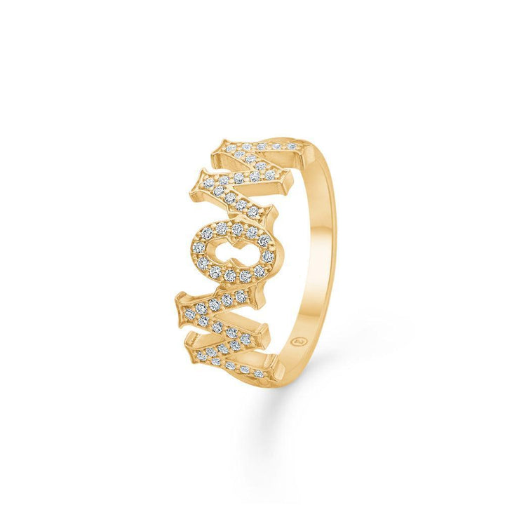 Mads Z 14kt Wowmom Ring 0.23ct W/SI shows a gold ring with WOWMOM letters set with diamonds. Model 1541099-001-1