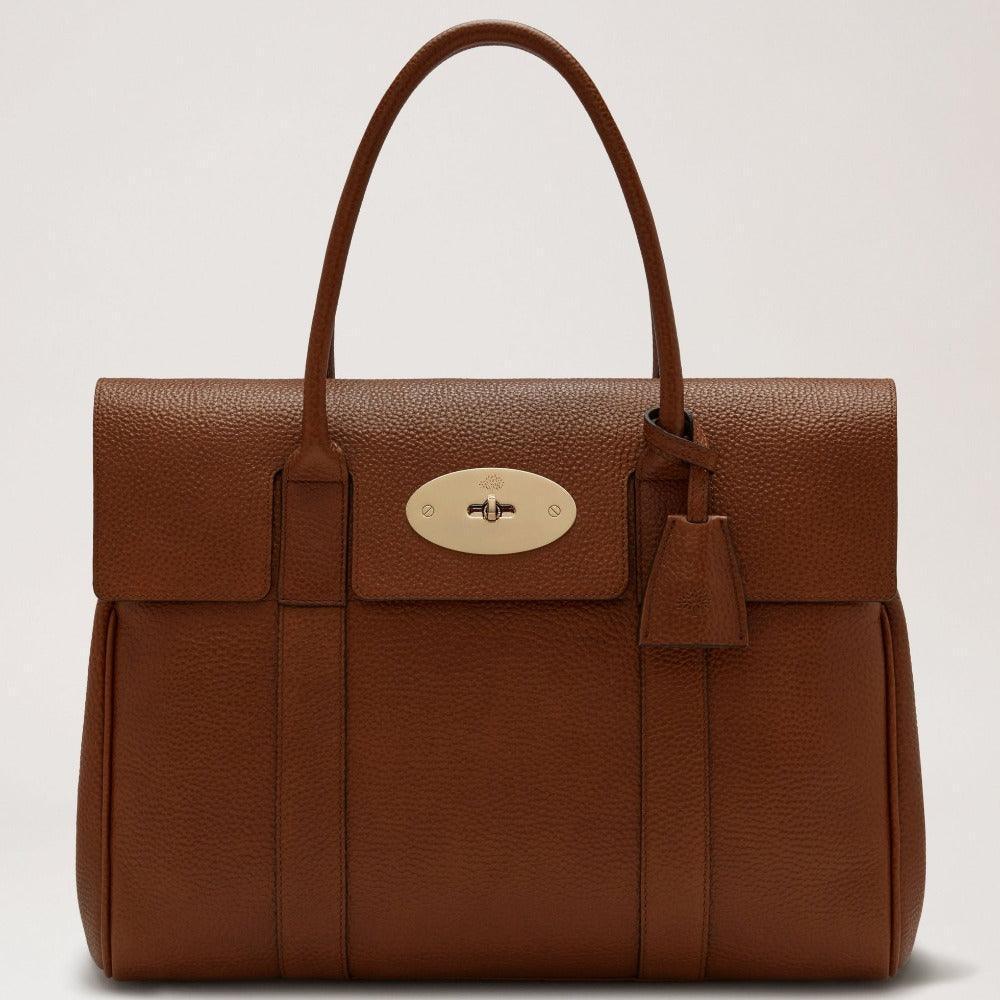 Mulberry Bayswater Small Classic Grain Oak handbag in brown leather with gold hardware. Model HH8727552G110.