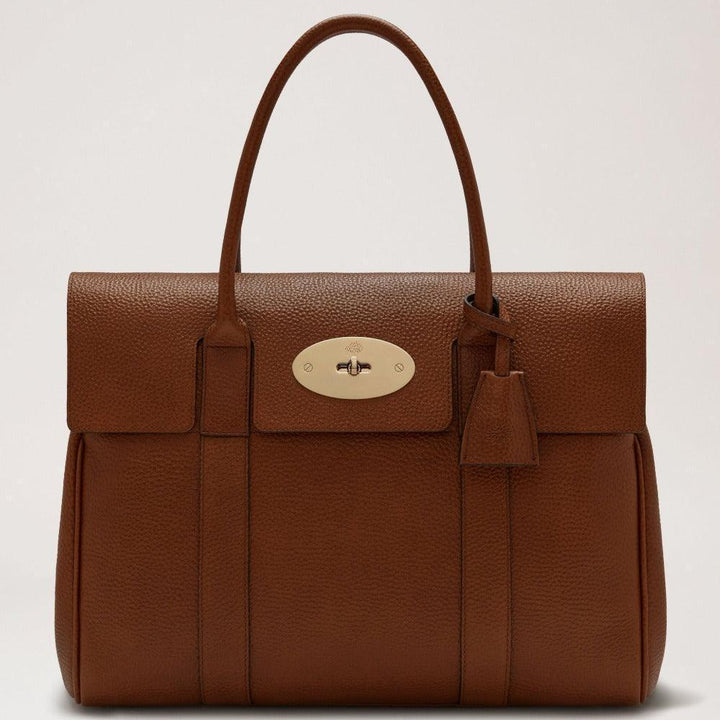 Mulberry Bayswater Small Classic Grain Oak handbag in brown leather with gold hardware. Model HH8727552G110.