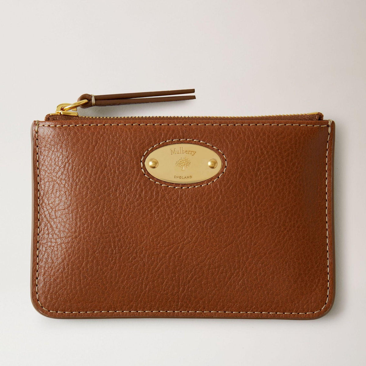 Mulberry Purse Plaque Small Zip Pouch Oak NVT Legacy in brown leather with golden label, Model RL7084275G110