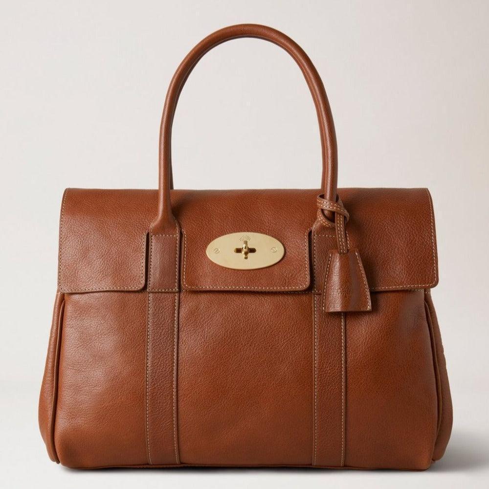 Mulberry Bag Bayswater Legacy NVT shows structured brown leather bag with classic gold buckle, Model HH7941275G110