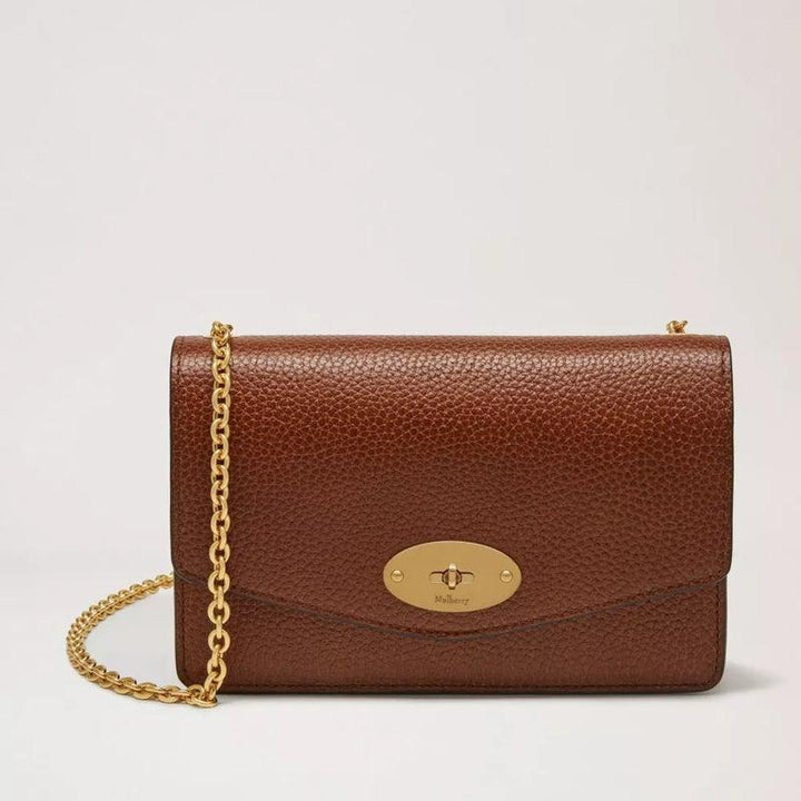 Mulberry Bag Darley Oak Small Classic Grain Leather shows a brown leather bag with a gold chain strap. Model RL7413552G110
