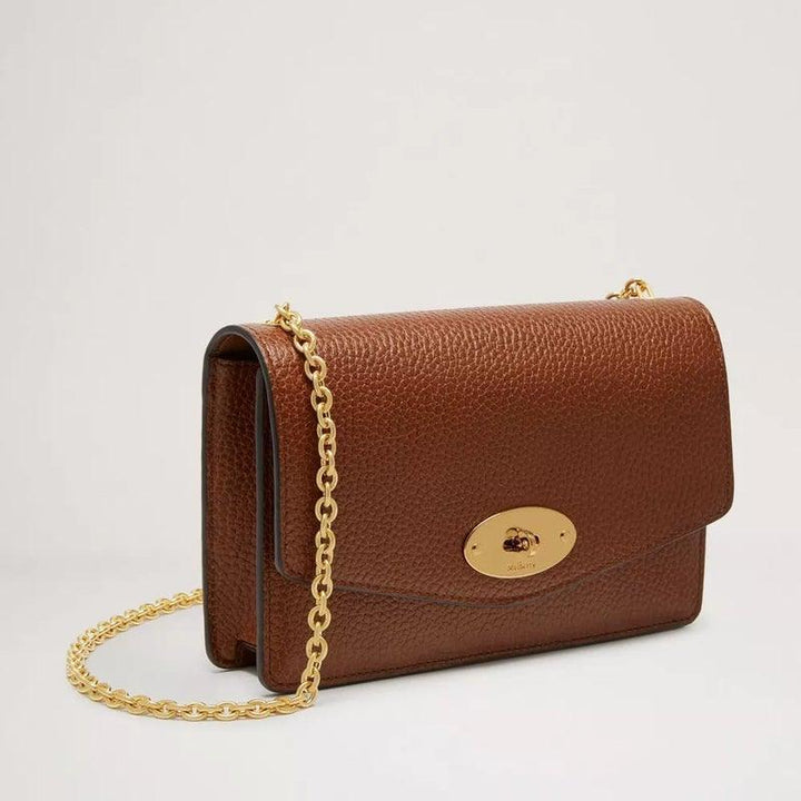 Mulberry Bag Darley Oak Small Classic Grain Leather is seen in brown leather with gold chain and gold buckle. Model RL7413552G110.