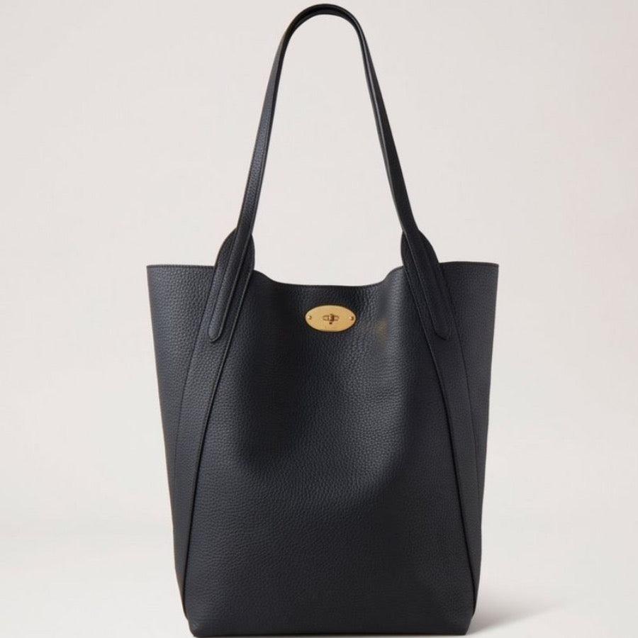 Mulberry Bag North South Bayswater Tote black shows a black leather bag with gold plate on the front. Model HH9104/736A100