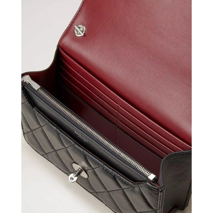 Mulberry Bag Small Darley Black Quilted Shiny Calf with open burgundy leather interior and card pockets.