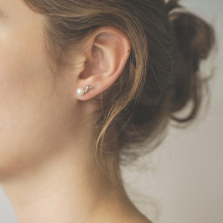 Polar Jewelry Bubble Silver Earrings show on ear, pearl and small silver bubbles, Model bub-st-l-sl-wp-00141-2