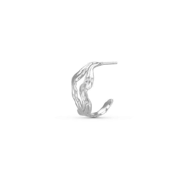 Polar Jewelry Cosmos Silver Hoop Single with organic design in silver metal on white background. Model cos-hp-sl-wz-00404-2.