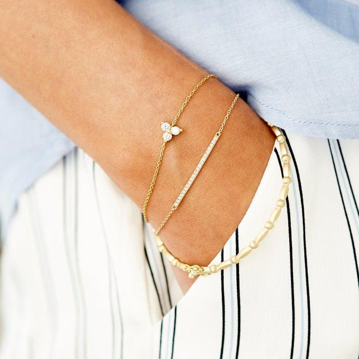 Ro Copenhagen 18kt Fryd bracelet shown on hand, elegant gold chain with diamonds. Model 106575-001
