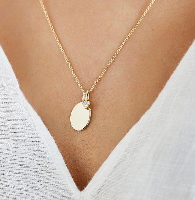 RO Copenhagen 18kt Orbit Dot Diamond Pendant shown on neck, round gold pendant with diamond, Model 96715-2.