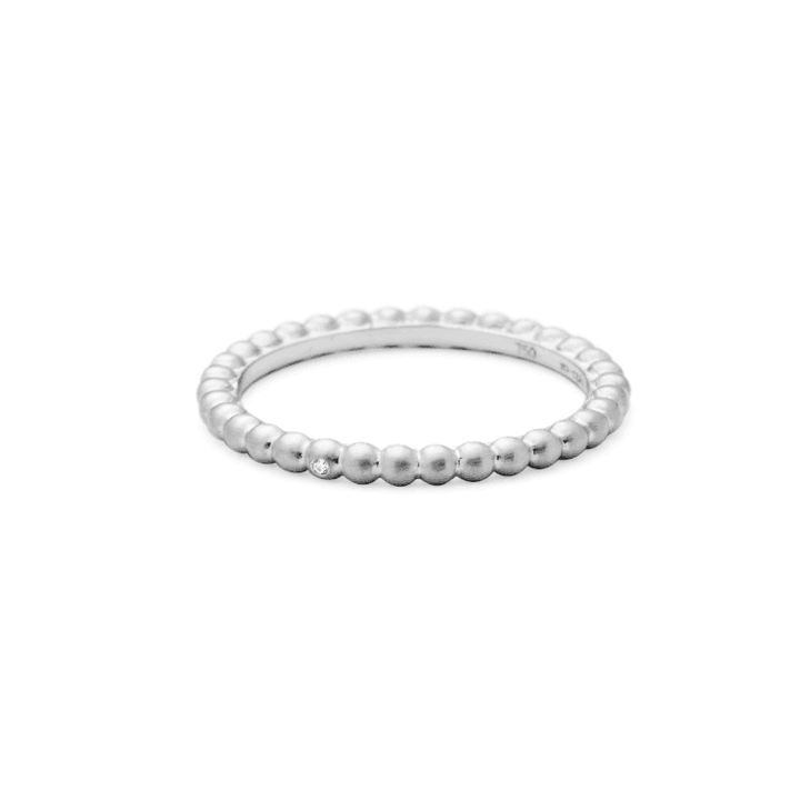 RO Copenhagen 18kt Orbit Dot Ring White gold, simple ring in white gold with a discreet pearl look. Model 90658-001.