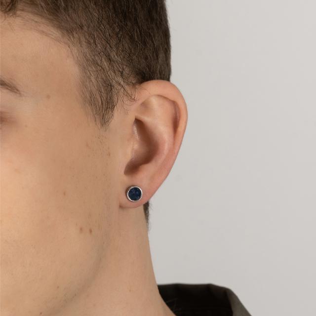 Son of Noa Orestik with sodalite is shown in model's ear, blue stone in simple metal frame. Model 325184-325184-2