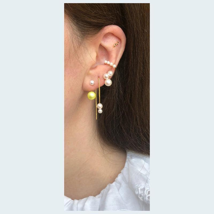 Deux Threader Chain Earring with pearls shown on ear, elegant white and yellow pearl details, Model fw2013-fw2013-2